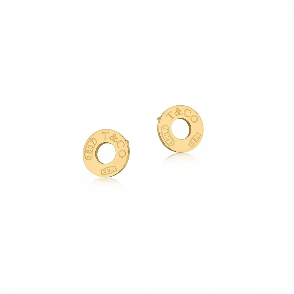 Aretes de botón circulares Mi tienda 2 Tiffany & Co 1837 en oro pulido con grabado icónico y diseño minimalista