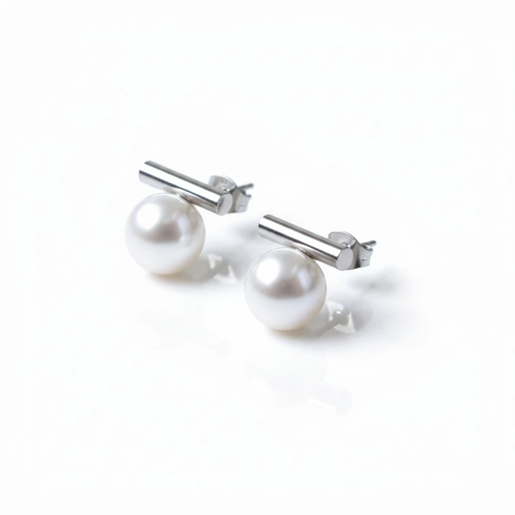 Aretes de perlas Mi tienda 2 con diseño minimalista de barra metálica horizontal y acabado brillante