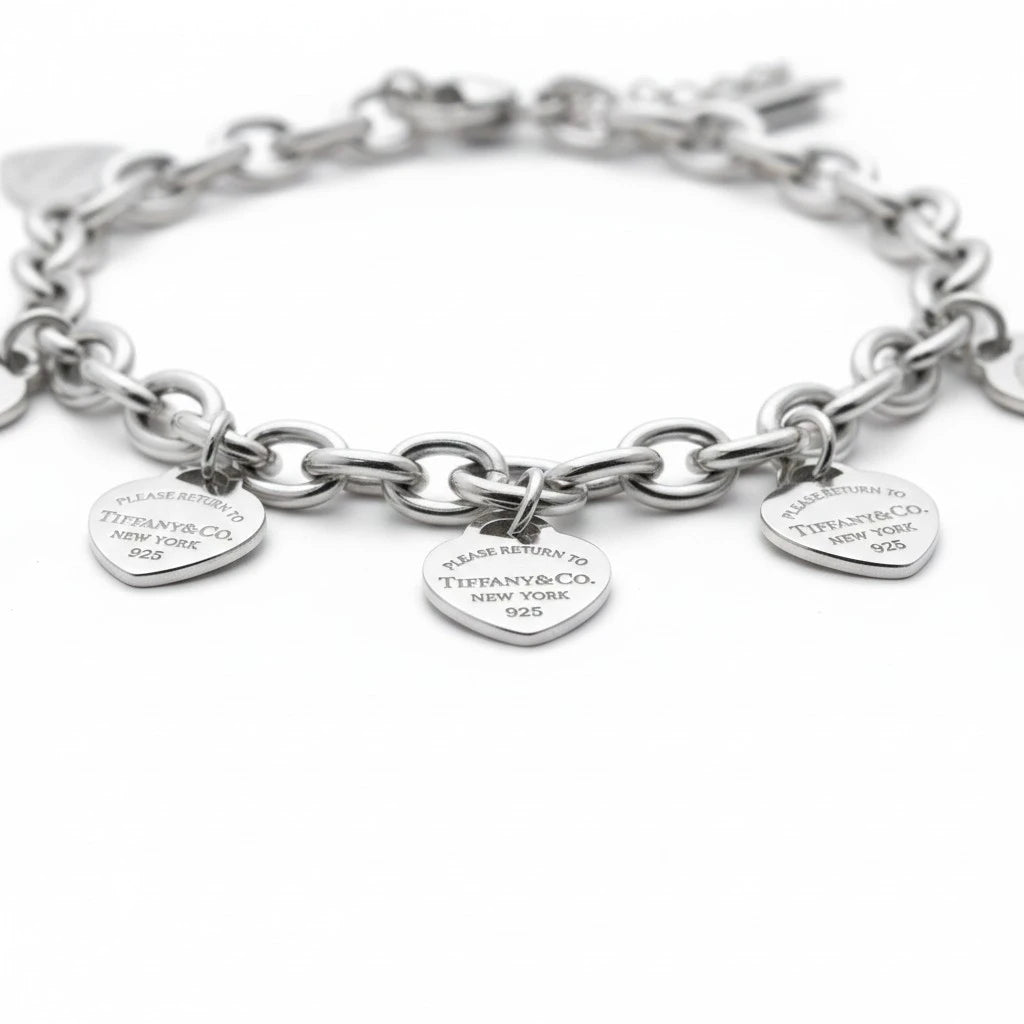 Pulsera de eslabones Mi tienda 2 en plata de ley 925 con dijes de corazón grabados y acabado brillante.